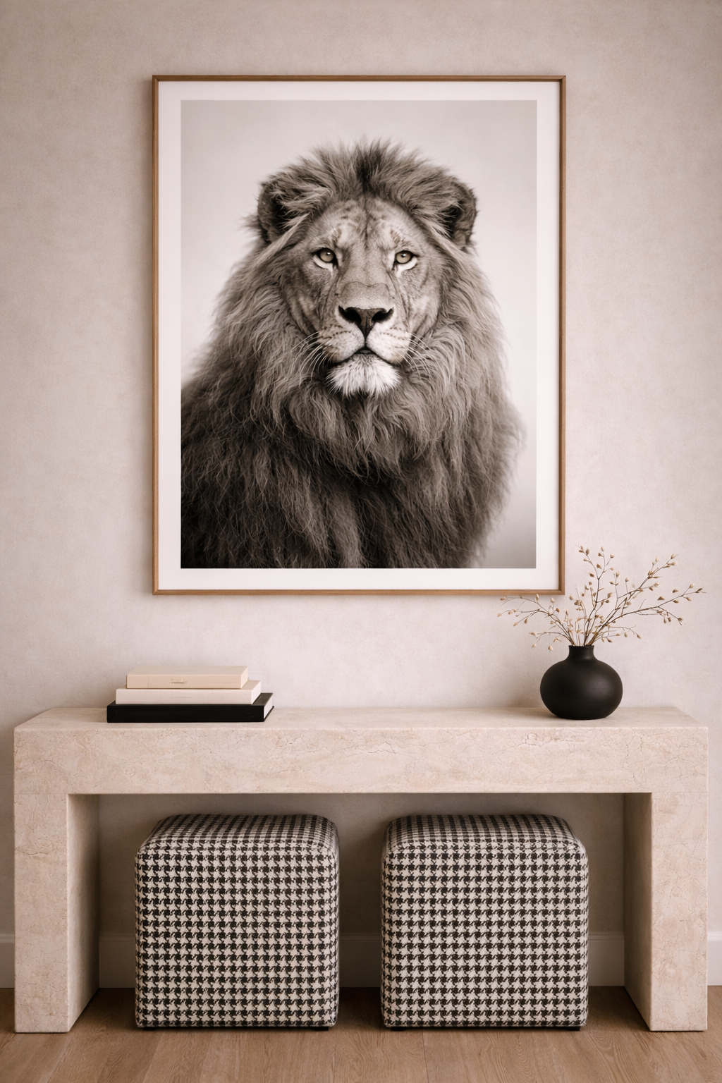 Stone console with upholstered stools and a framed lion portrait